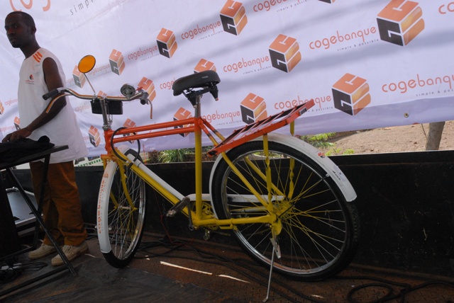 Buri munsi w'isiganwa, COGEBANQUE izajya itanga igare ku mukiriya wayo aho basoreje
