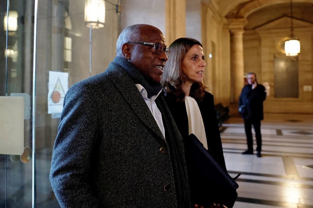 Ubwo Dr. Munyemana yageraga ku cyumba cy'iburanisha ari kumwe n'umunyamategeko we