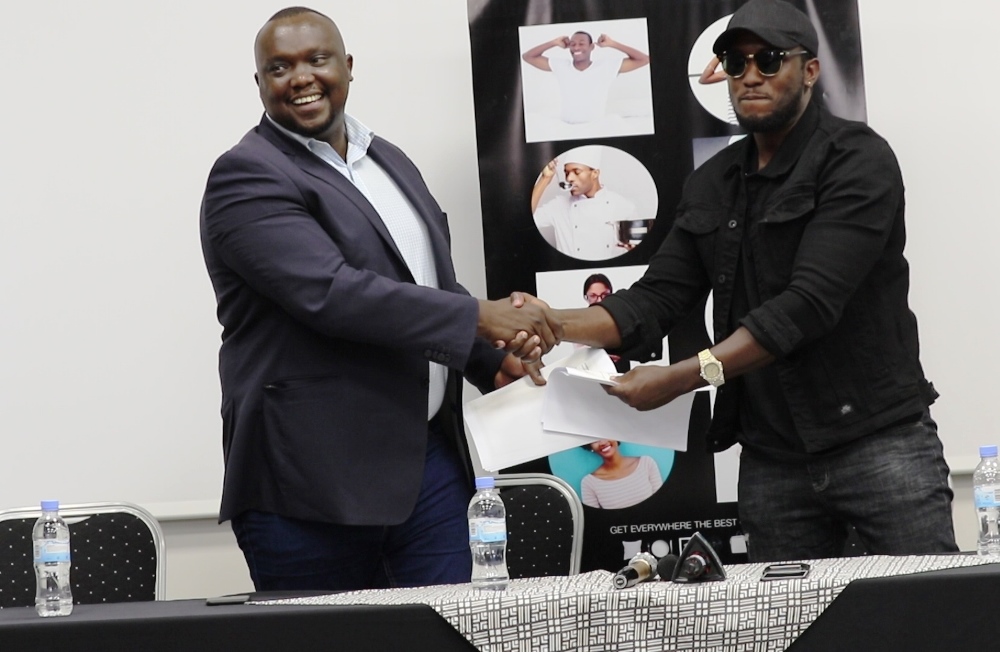 Umuhanzi The Ben yasinye amasezerano y’imikoranire na Onomo Hotel yiyemeje kumushyigikira mu muziki we